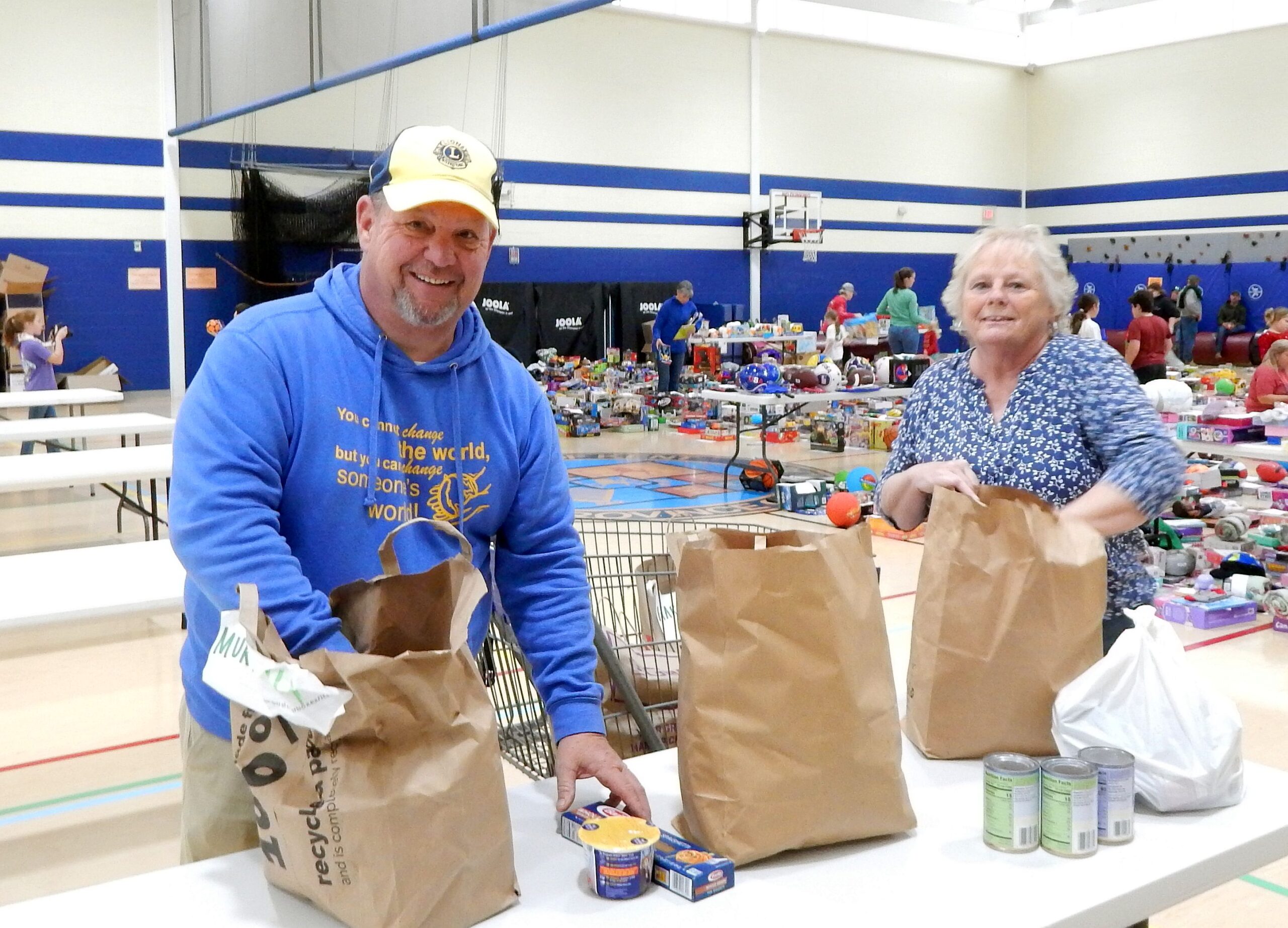 https://chestertownspy.org/files/2023/12/Lions-Glenn-Owens-and-Debbie-Conner-sort-donated-food-items-for-Christmas-Baskets-scaled.jpg